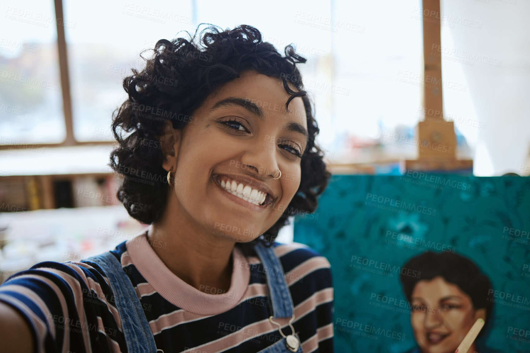 Buy stock photo Art, selfie and Indian woman with painting on canvas while working in a creative studio. Face portrait of a girl, artist or painter taking a photo with paint job with smile in creativity workshop