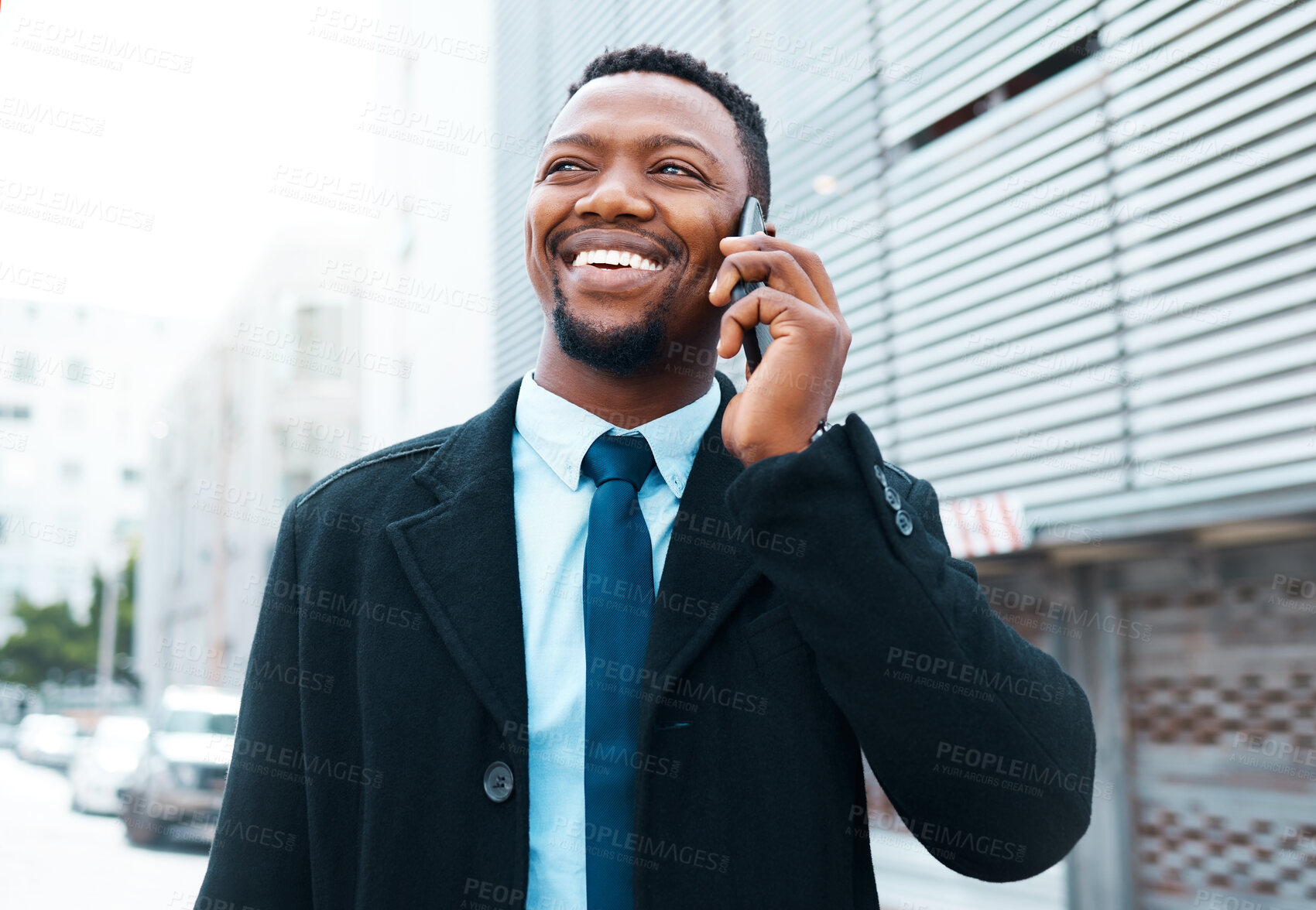 Buy stock photo Black, businessman and phone call for communication in the city and smile for happy discussion in success. African American man smiling for successful conversation on smartphone in a urban town