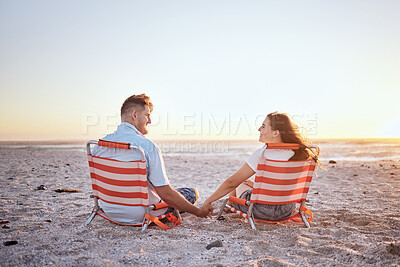 Buy stock photo Love, relax and couple holding hands on the beach for comfort, peace and wellness while on Toronto Canada vacation. Mockup sky, sunset and bonding man and woman enjoy romantic quality time together