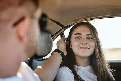 Buy stock photo Love, travel and smile with woman in car with man on road trip vacation for summer, freedom and care. Happy, transportation and adventure with couple on date together for journey, relax and peace