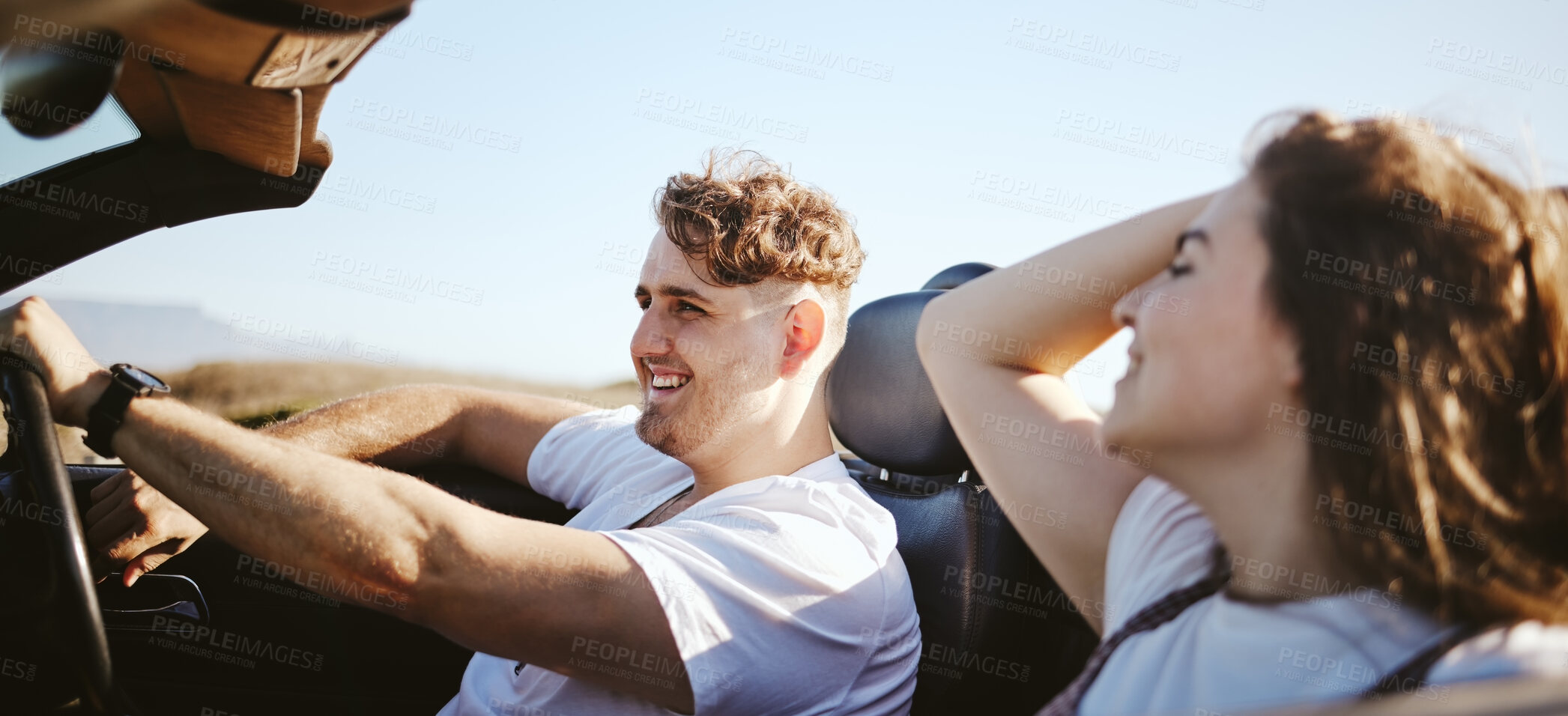 Buy stock photo Road trip, happy couple and travel while in a convertible car for fresh air, adventure and journey with partner enjoying trip, love and freedom. Man and woman taking drive and traveling in Australia