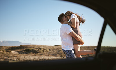 Buy stock photo Kiss, love and couple on road trip with car in nature of California together during summer. Young man and woman kissing while on travel holiday with transport in the countryside for adventure