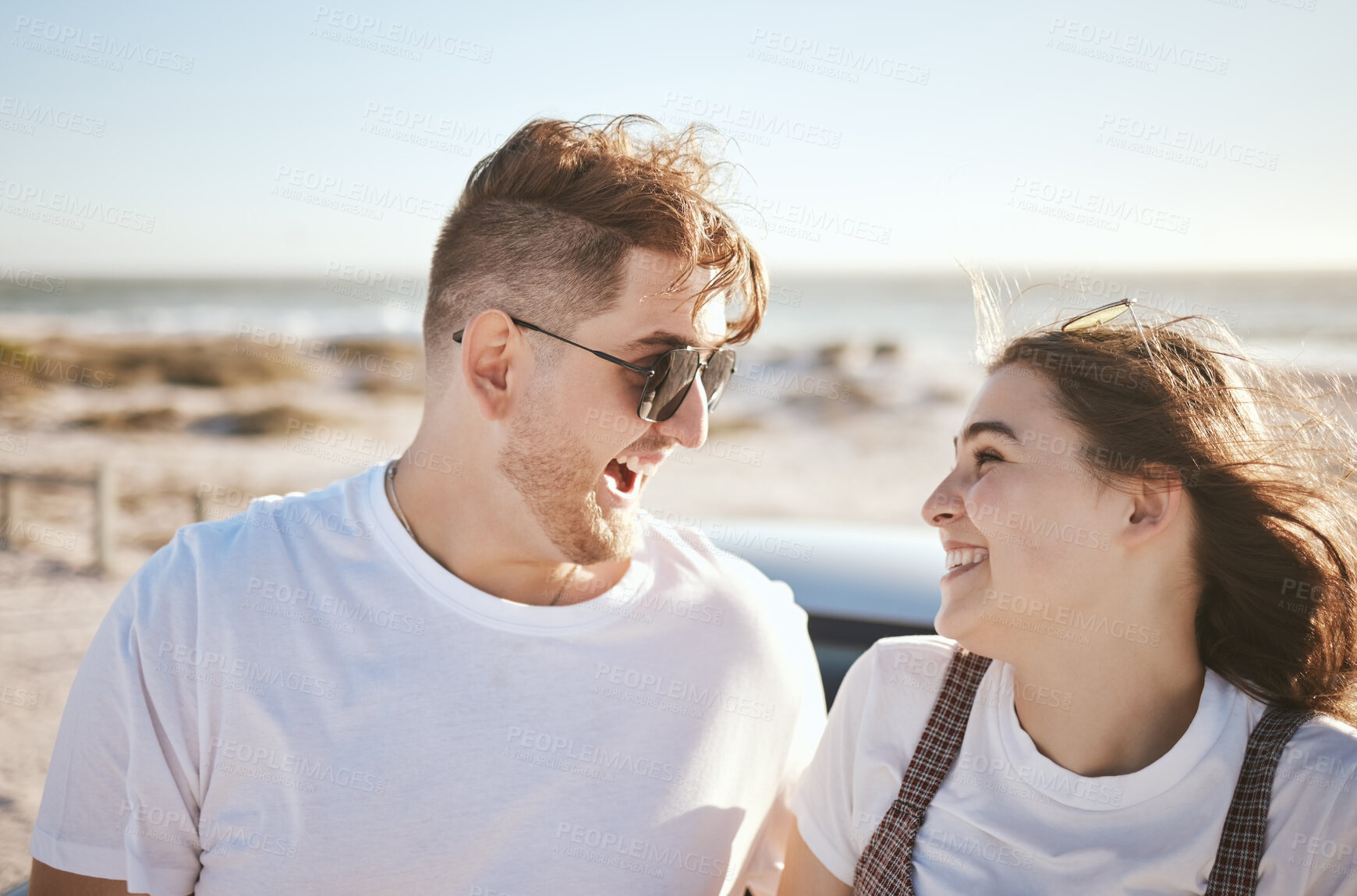 Buy stock photo Travel, beach and holiday in summer with happy couple smile, love and laugh while on the ocean by the seaside. Happy french man and woman enjoy exotic honeymoon having fun at sea tropical vacation