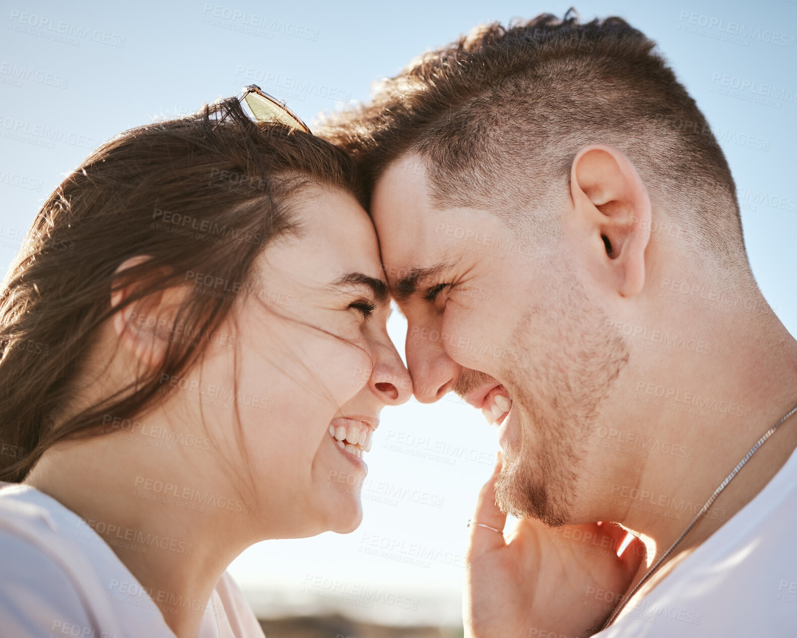 Buy stock photo Happy, couple and forehead faces, love for relationship travel in joyful happiness together with smile in the outdoors. Man and woman smiling for real loving, caring and bonding or touching moment