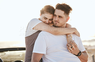 Buy stock photo Real couple hug, road trip and relax at sunset on a romantic driving vacation in Costa Rica together. Happy white man, woman travel the country in a car and holding hands at peace with a smile