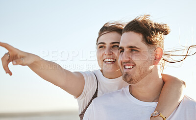 Buy stock photo Vacation, view and travel with a normal couple sightseeing while on holiday together during summer. Sky, love and traveling with a real man and woman pointing while outside on a weekend getaway