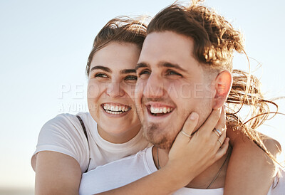 Buy stock photo Love, couple and being happy while smile, relax and embrace with bonding, joyful or romantic hug. Real relationship, young man and woman celebrating loving and on holiday or vacation together