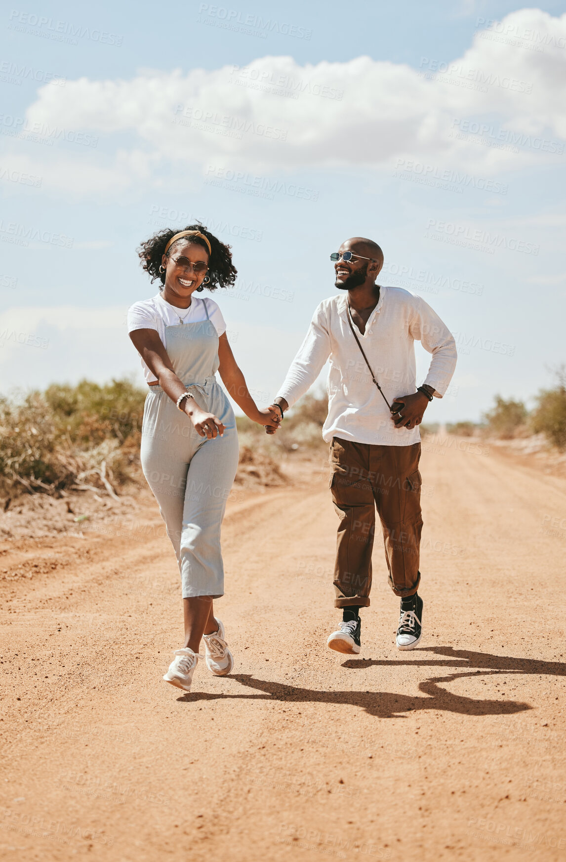 Buy stock photo Black couple on road trip, happy people walking on vacation and Los Angeles festival travel. Summer holiday, trendy fashion lifestyle and love happiness on happy outdoor desert adventure together