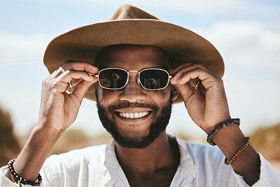 Buy stock photo Vision, style or fashion sunglasses for black man with designer, trend or cool optometry eye care. Zoom, smile or happy face of tourist, model or student on safari travel in Kenya nature environment
