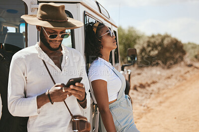 Buy stock photo Safari travel, fashion and african couple with car and smartphone for social media update, location check and countryside lifestyle. Influencer black people or youth with summer clothes and transport