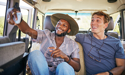 Buy stock photo Travel, friends and selfie on a phone by men on a road trip, bonding on a backseat while driving in a vehicle. Freedom, relax and happy black man taking photo with friend on their journey together