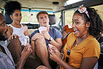 Playing cards, road trip and friends in a van winning and excited for adventure journey, holiday and youth games lifestyle. Diversity, gen z and camper group of people camping together in caravan car