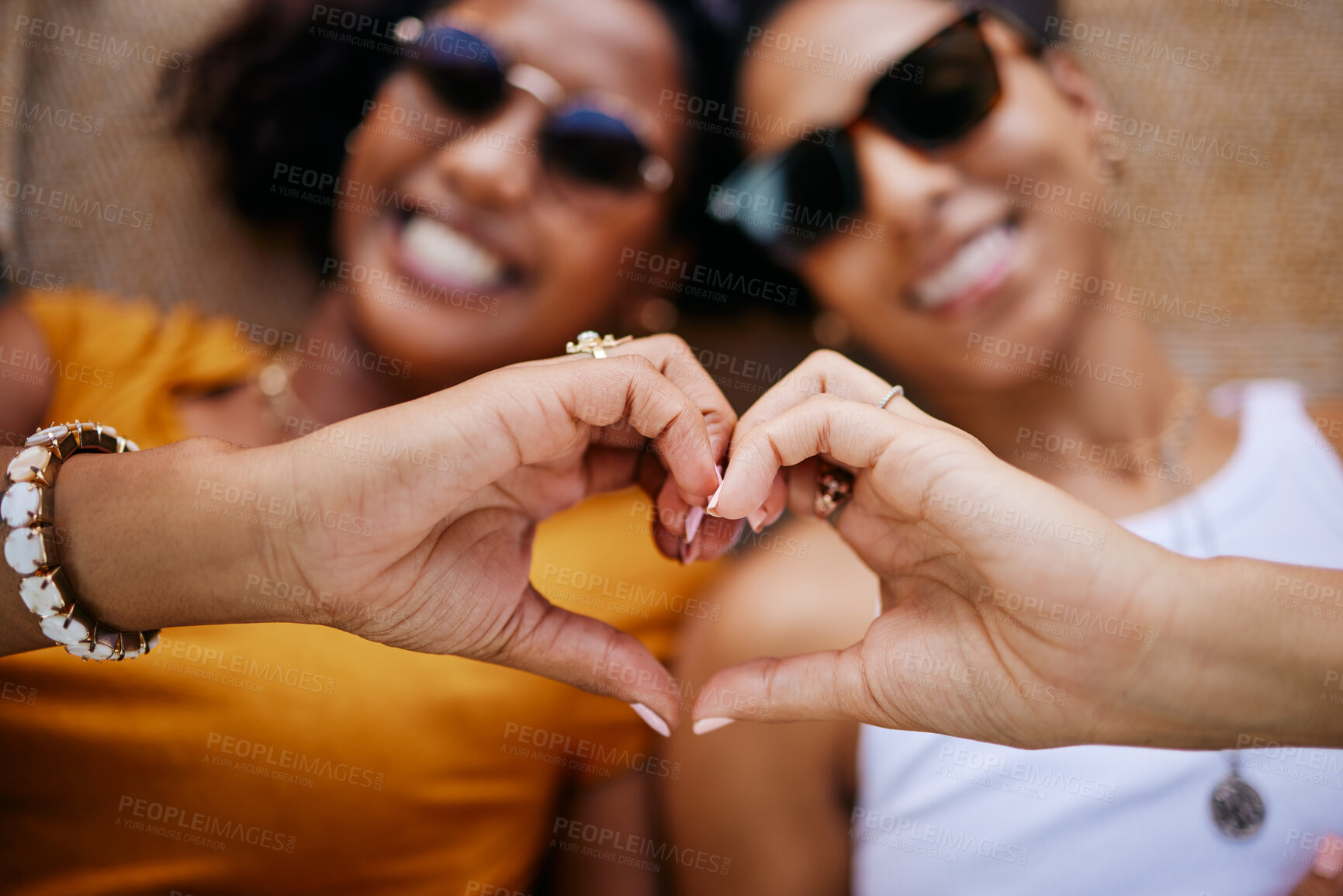 Buy stock photo Heart sign, lgbtq couple and women happy, smile and show relationship together being romantic. Love, queer, or friends or proud black girls celebrate loving, romance or peace while relax with passion