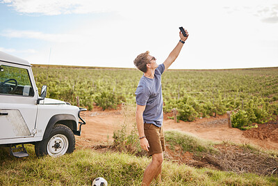 Buy stock photo Phone selfie, travel and car road trip nature of a man using a mobile outdoor on a drive break. Countryside, summer vacation and person using technology near a agriculture farm and motor transport