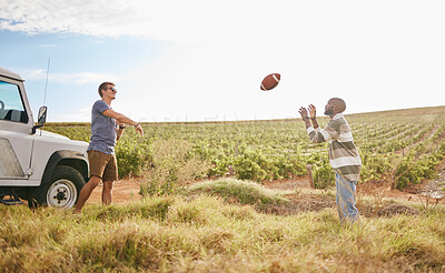 Buy stock photo Friends on a trip, travel and play football in nature on field in countryside. Fun, care free men playing together and relaxation on holiday break for bonding in serene landscape in summer.  
