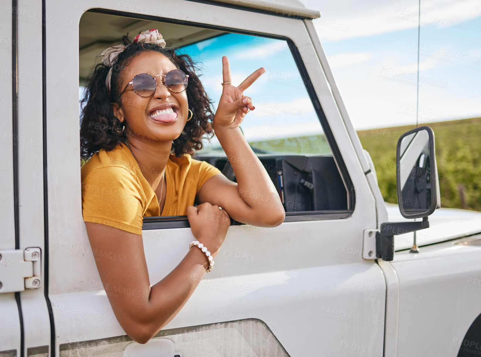 Buy stock photo Car, road trip and girl with sign of peace, crazy high energy and on fun transportation adventure in Australia countryside. Hands, travel journey and black woman happy and excited on safari excursion