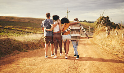 Buy stock photo Friends, hug and vacation in the countryside for holiday travel enjoying time together in nature. People in friendship support, care and love hugging on a dirt road walking in South Africa