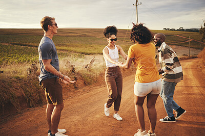 Buy stock photo Travel, friends road trip and happy free dance with diversity dancing together in a countryside. People having fun with quality time and positive traveler energy feeling freedom on a dirt trail