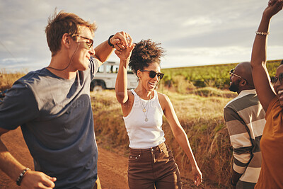 Buy stock photo Friends, road trip and dance with a man and woman on a vacation, holiday or getaway in the dessert on a sand road. Travel, diversity and nature with a group of young people enjoying freedom outside