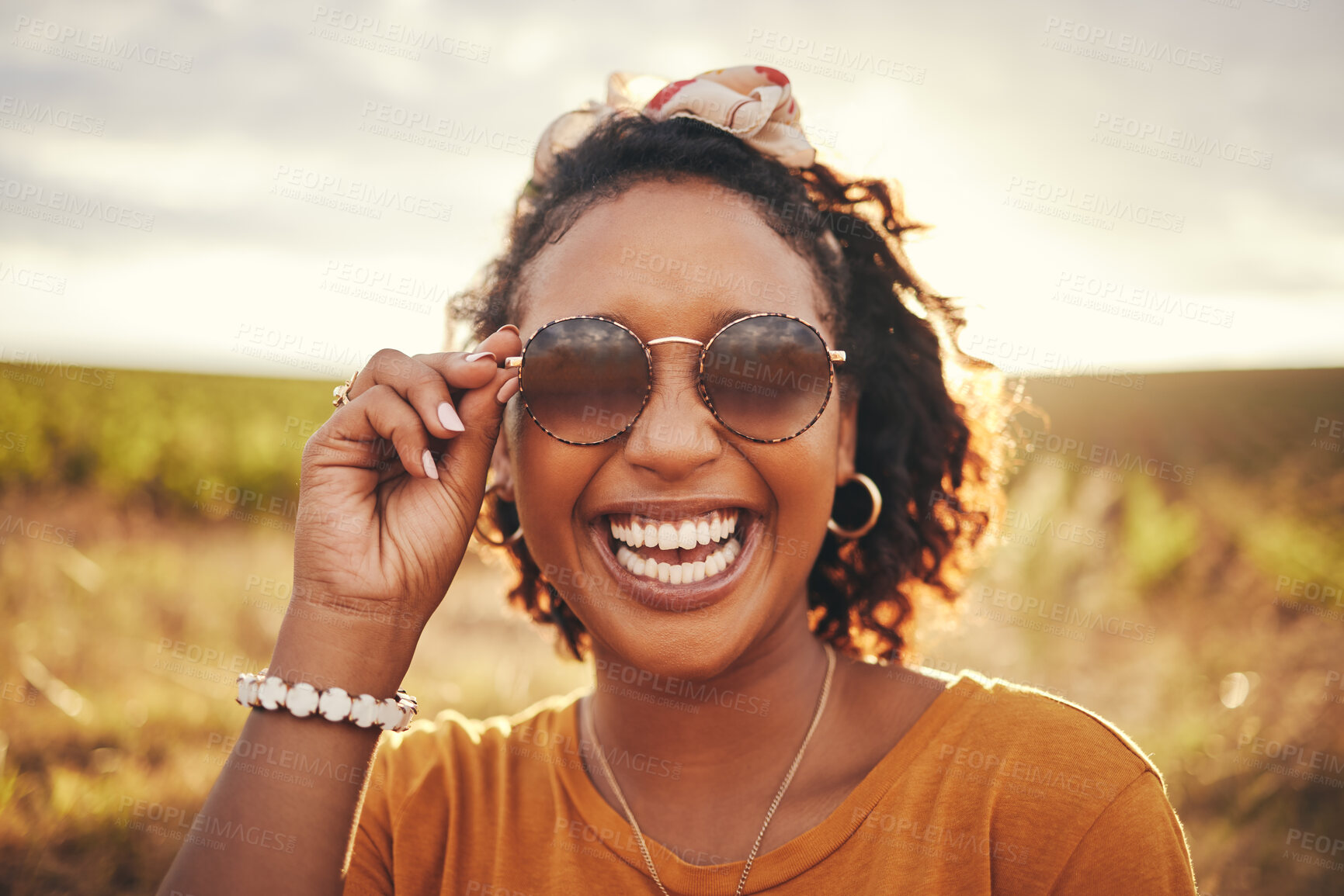 Buy stock photo Happy, freedom and black woman with smile on a safari during a holiday in Africa. Face portrait of an African girl with sunglasses in summer during travel in nature for vacation or adventure