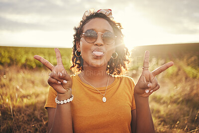 Buy stock photo Nature, freedom and peace hand sign by woman at sunset  in the countryside, happy and content while traveling, Portrait, grass and black woman having fun on road trip, taking break in rural landscape