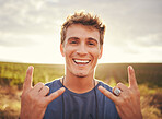 Hand sign, nature and man on holiday in the countryside of Portugal for freedom, peace and happiness in summer. Face portrait of a young, happy and smile person on vacation in a natural environment