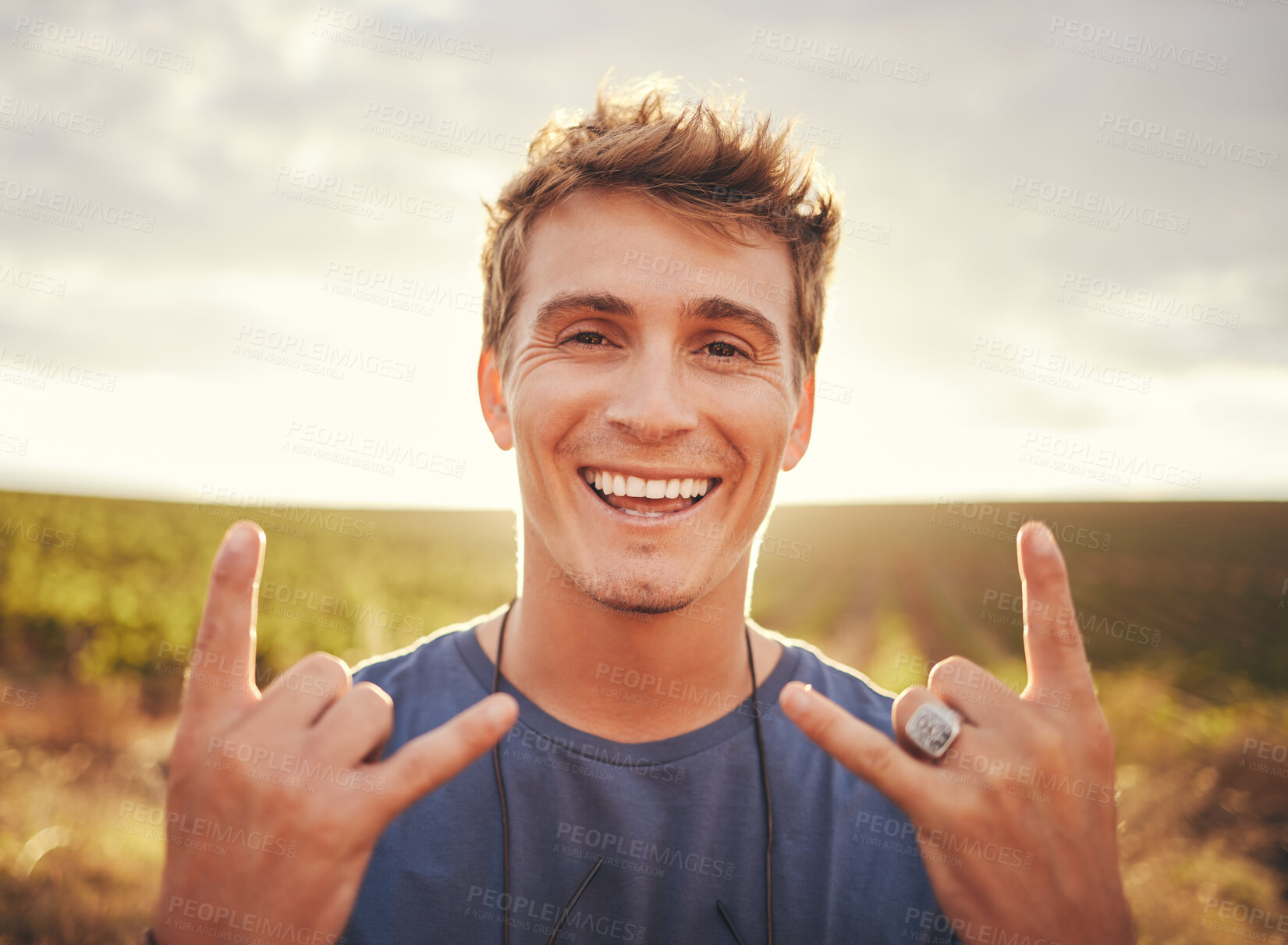 Buy stock photo Hand sign, nature and man on holiday in the countryside of Portugal for freedom, peace and happiness in summer. Face portrait of a young, happy and smile person on vacation in a natural environment
