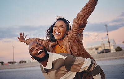 Buy stock photo Freedom, love and happy with couple and piggy back ride together on outdoor date for support, sunset or lifestyle vacation. Smile, summer and airplane with man and woman on holiday for relax or faith