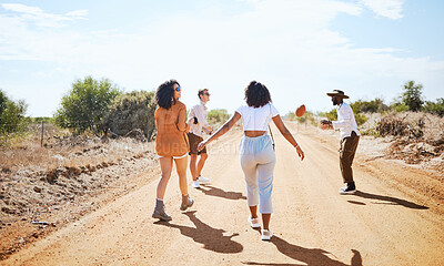 Buy stock photo Freedom, countryside and friends walking on adventure in summer, bonding on dirt road in nature. Wellness, journey and holiday in Mexico with happy, relax and cheerful men and women enjoying vacation