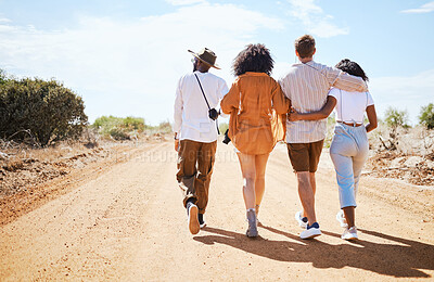 Buy stock photo Friends, walking and travel with young people in nature on a sand road with a beautiful desert view of the sky. Vacation, summer and walk with a man and woman group outdoor for a trip or holiday