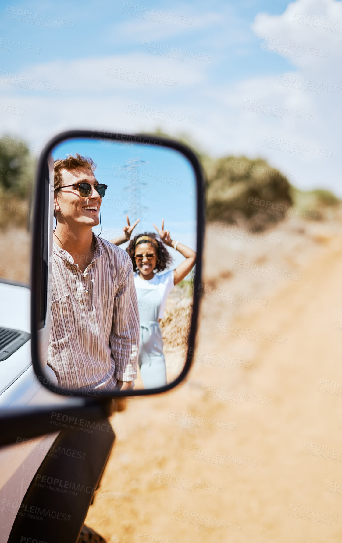 Buy stock photo Couple on road trip, smile in car mirror reflection and happy smile with love on desert holiday road trip drive in South Africa. Summer vacation in the wild, diverse male and female friends with fun