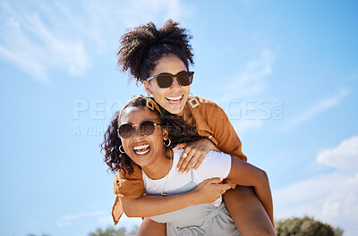 Buy stock photo Summer, friends and freedom with women and piggy back against the blue sky for hug, lifestyle and happy on Puerto rico holiday. Youth, crazy and friend with girl on vacation with glasses and a smile