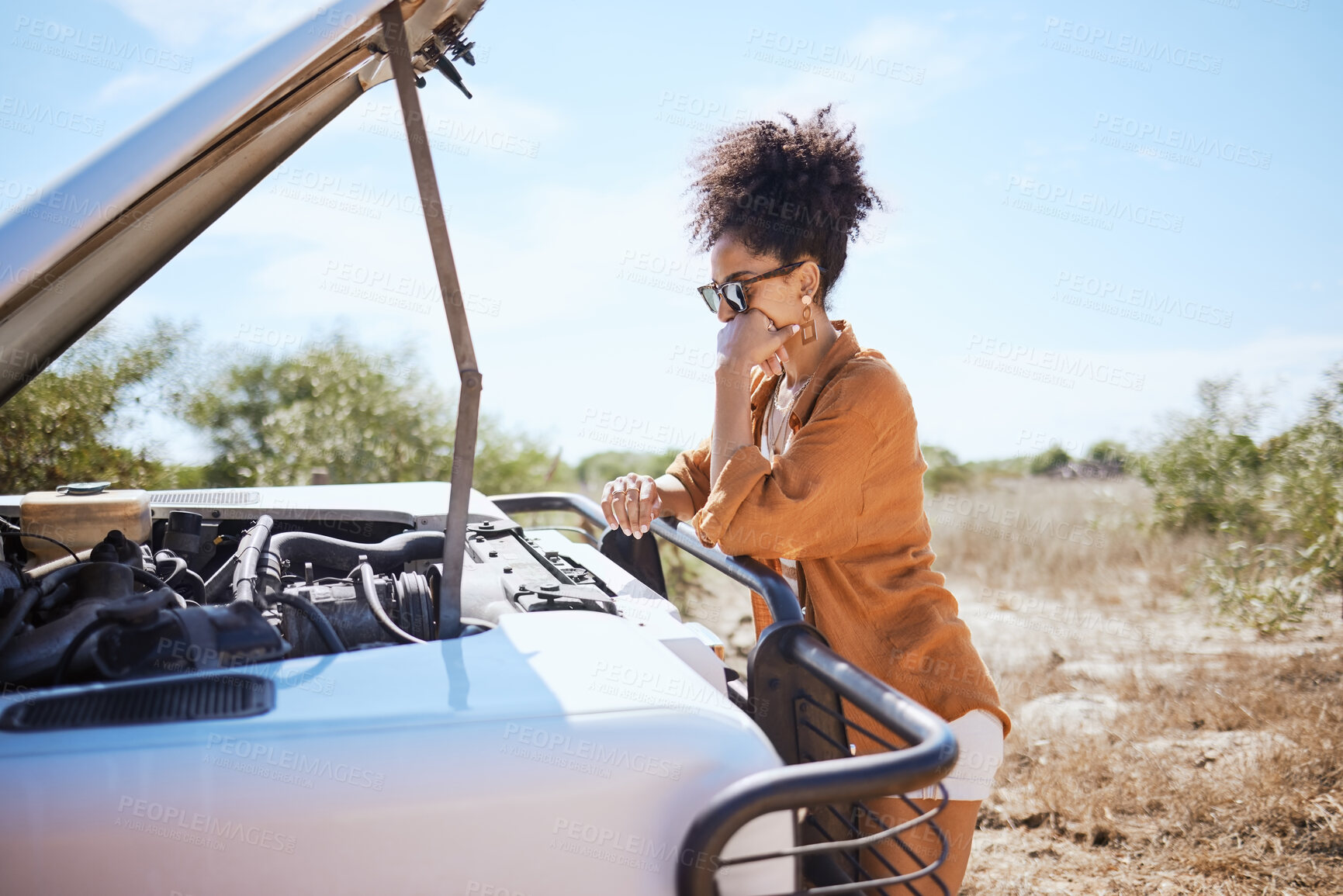 Buy stock photo Road trip, engine and woman with car problem during holiday in nature. Sad African girl with anxiety about accident, battery fail and emergency with transportation while on a safari in Africa