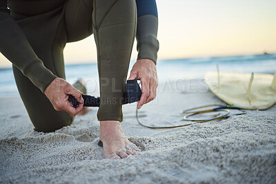 Buy stock photo Foot, with surfboard and leash on sand prepare to enter sea, on beach and to relax on holiday, vacation and wet suit. Surfing, healthy man and ready to surf ocean for wellness and health on seaside.