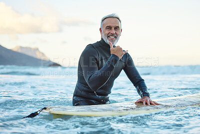 Buy stock photo Senior man surfing in Hawaii beach, surf culture hands signal and healthy fitness in ocean nature. Friendly surfer easy greeting, retirement travel of elderly person and sea adventure lifestyle
