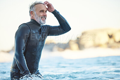 Buy stock photo Beach, elderly surfer man in water and happy ocean holiday in Australia. Freedom, sea and happiness, fun on retirement surf vacation. Health, free time and sports in nature, a senior smile in waves.