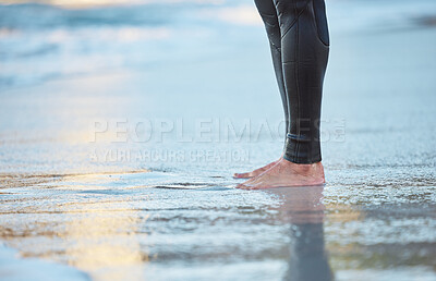 Buy stock photo Surf, water and legs of man on the beach for fun adventure, fitness and exercise workout in Rio de Janeiro Brazil. Sand, wellness peace and feet of surfer with wetsuit for sports surfing in ocean sea