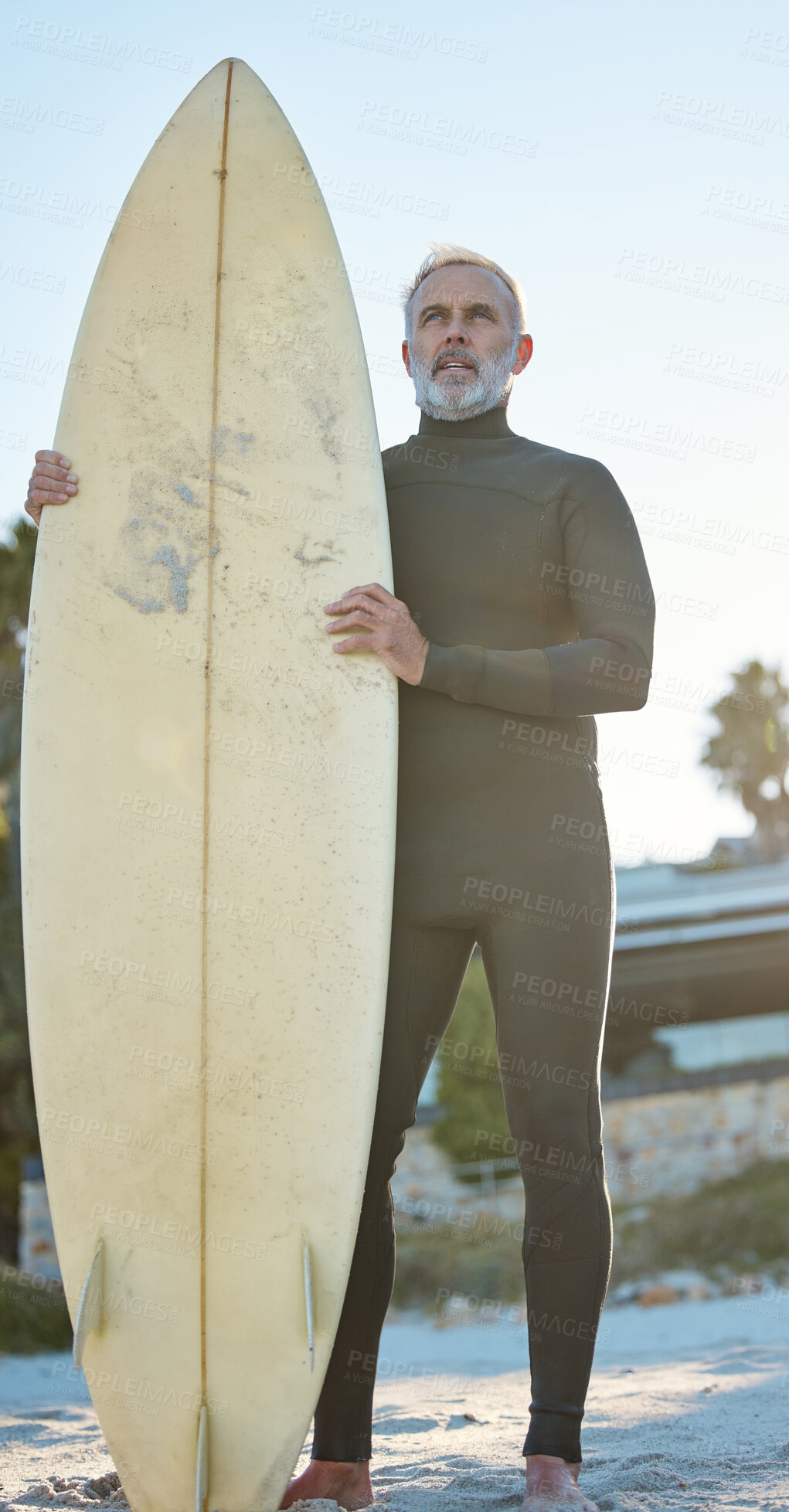 Buy stock photo Beach, board and surfer on holiday by the ocean of Costa Rica with idea for adventure in retirement during summer. Mature man surfing on travel vacation by the sea and tropical ocean for health