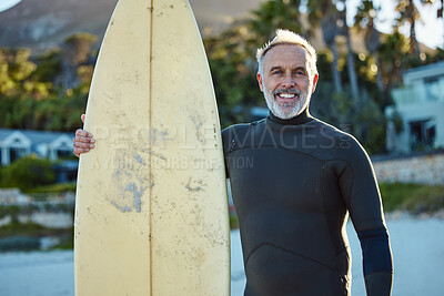 Buy stock photo Surfer, surfing and portrait of old man at the beach with his surfboard. Ocean, surf and senior man doing water sports in Australia. Summer, travel and happy mature guy enjoying retirement by the sea