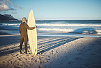 Beach, board and man surfing on holiday in the summer water of Brazil during retirement freedom. Back of mature surfer on travel vacation by the ocean on an island for the waves with his surfboard
