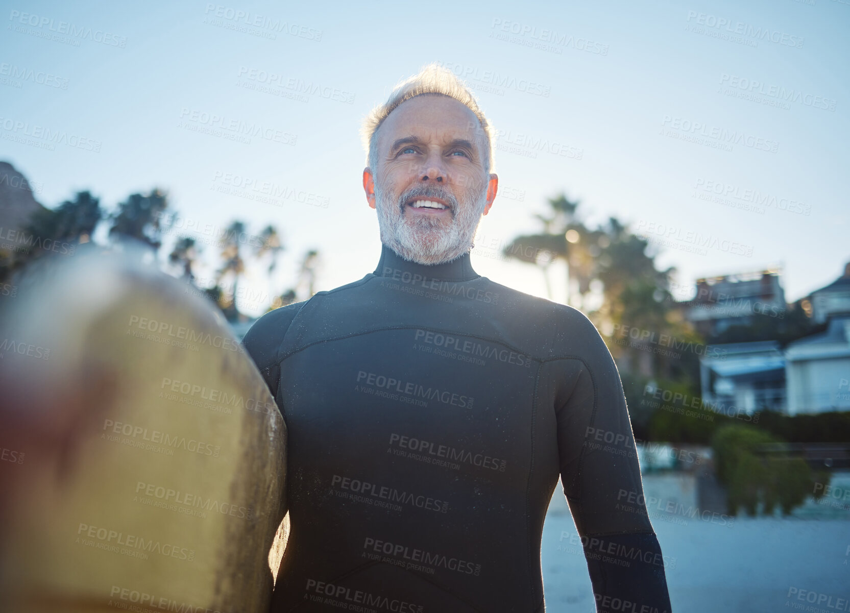 Buy stock photo Beach, surfer and old man at sea ready to start surfing on summer holiday vacation in his retirement in Hawaii. Freedom, ocean and senior man with surfboard feeling confident, excited and happy 