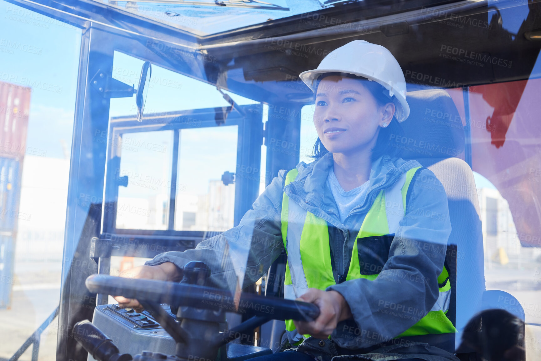 Buy stock photo Supply chain, logistics and transport with a woman shipping worker driving a vehicle on a commercial container dock. Freight, cargo and stock with an asian female courier at work in the export trade