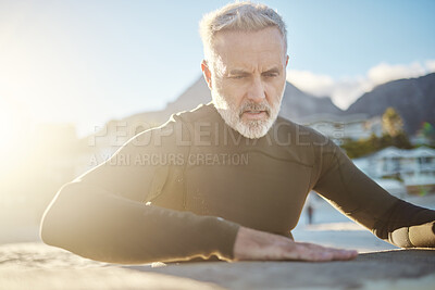 Buy stock photo Beach, surfing and man cleaning his board on holiday in Hawaii for travel adventure in retirement during summer. Mature surfer with clean surfboard from sand on a vacation by the tropical ocean 