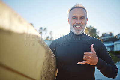 Buy stock photo Beach, surf board and a happy elderly surfer man with hand sign and smile. Freedom, water sports and happiness, fun on retirement holiday in Australia. Health, fitness and senior ready for surfing.