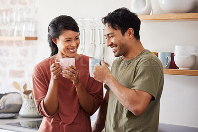 Buy stock photo Happy, kitchen and couple in morning conversation together with cup of coffee at their home. Happiness, love and young man and woman from Mexico drinking tea, bonding and talking with smile in house.