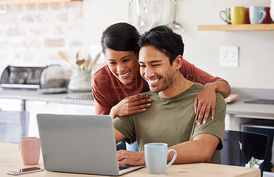 Buy stock photo Laptop, internet and couple in communication on social media with coffee in the kitchen of their house. Man and woman with smile while reading an email on technology with drink of tea in the morning