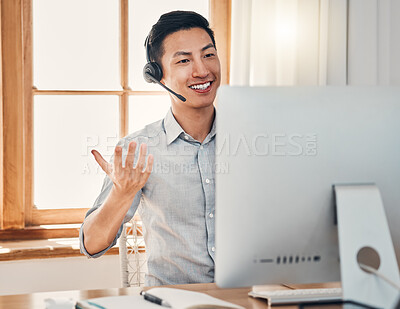 Buy stock photo Call center, telemarketing and customer support consultant working on a computer in modern office. Happy, smile and asian man doing online consultation for ecommerce sales, customer service and crm.