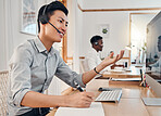 Consulting, call center and help with businessman at computer talking on phone call for customer support, telemarketing and sales. Communication, contact and inbound marketing with employee at desk