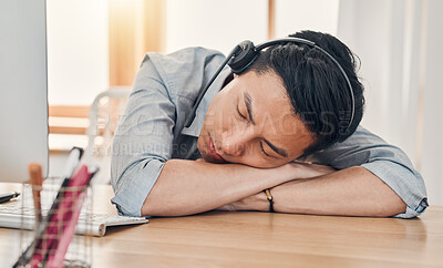 Buy stock photo Man, burnout and tired at work in call center, communication or customer support job in Shanghai. Asian, worker and crm sleeping in office at customer service, consulting or telemarketing in China