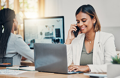 Buy stock photo Phone, laptop and communication with a woman graphic designer talking on a call in her office. Computer, creative and design with a female employee working on a project or website at her desk